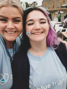 Staff wearing Blue Triangle t-shirts
